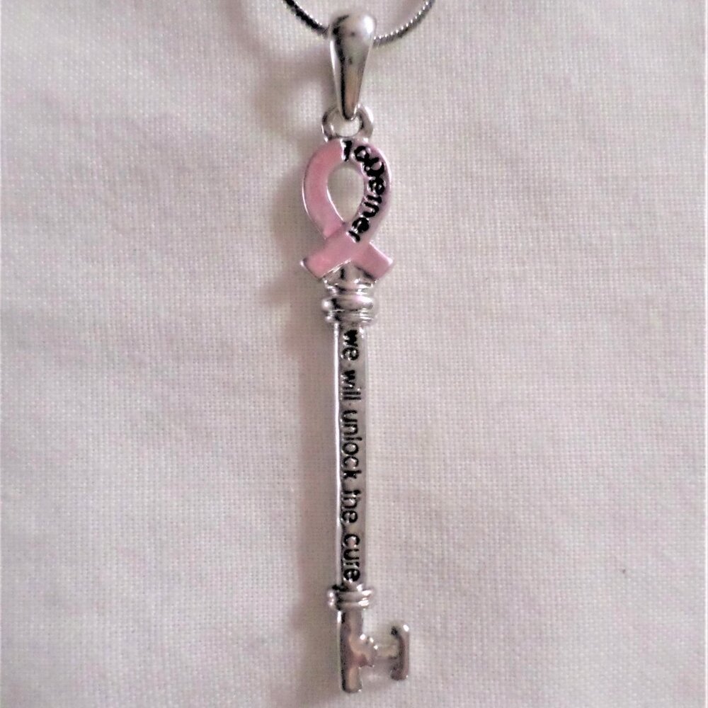 TOGETHER WE WILL UNLOCK THE CURE pink ribbon key necklace